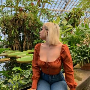 Orange button up top